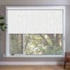 White Roller Shades in window