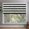 Black blackout zebra blinds in window